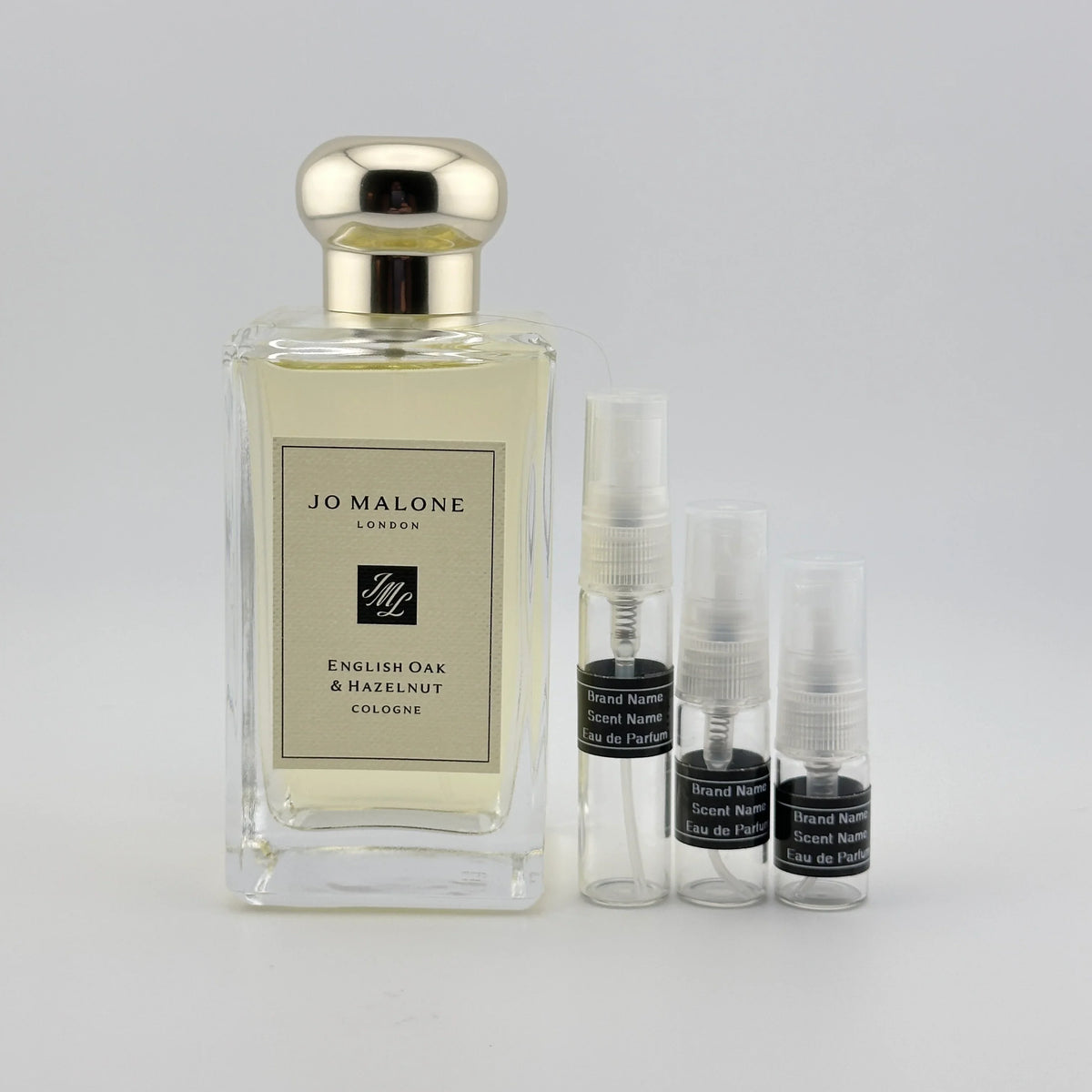 Jo Malone London English Oak & Hazelnut Cologne original perfume bottle, a unisex woody fragrance with green hazelnut, cedarwood and roasted oak, available as a perfume sample.