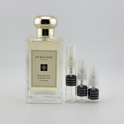 Jo Malone London English Oak & Hazelnut Cologne original perfume bottle, a unisex woody fragrance with green hazelnut, cedarwood and roasted oak, available as a perfume sample.
