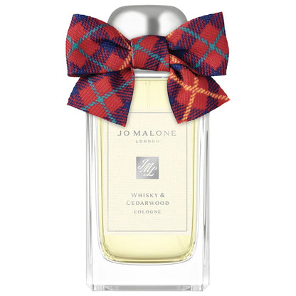 Jo Malone London Whisky & Cedarwood Cologne limited-edition perfume bottle, a warm woody spicy fragrance.