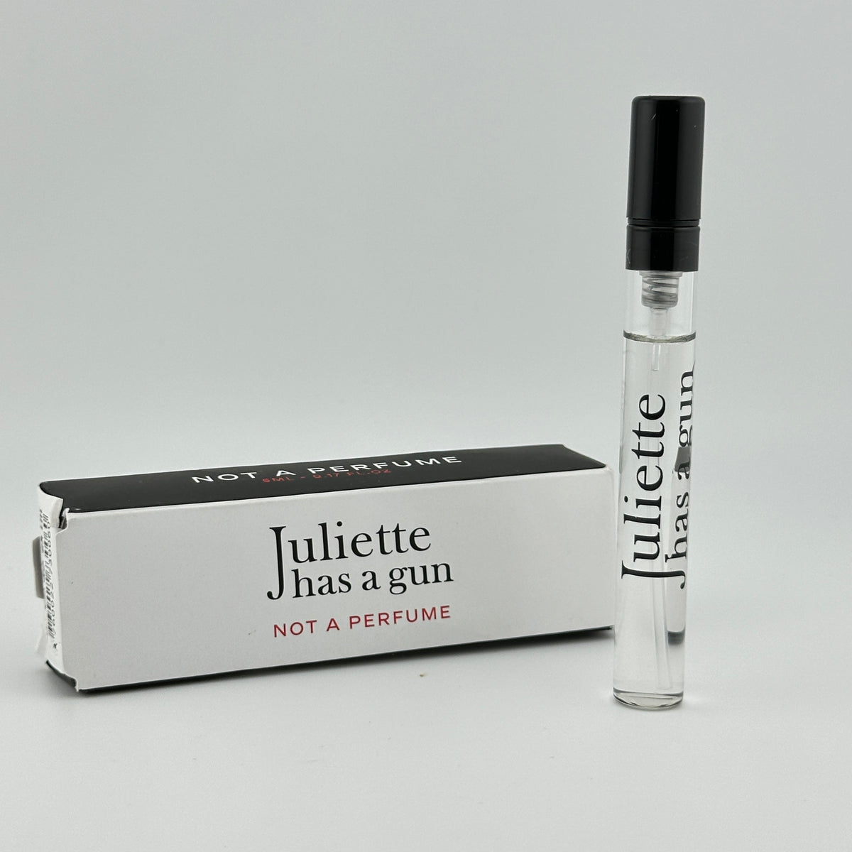 Juliette Has a Gun Not a Perfume EDP 5 mL sample bottle displayed with its original packaging.