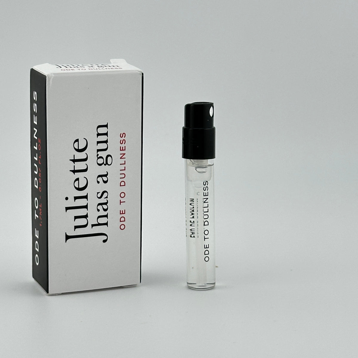 Juliette Has a Gun Ode to Dullness EDP 1.7 mL spray vial displayed with original manufacturer sample packaging.