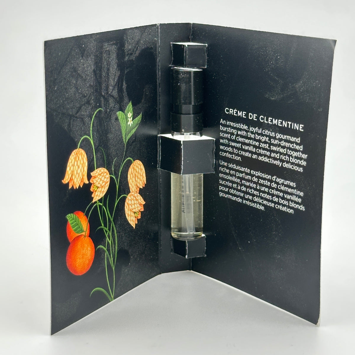 NEST Crème de Clementine Eau de Parfum 1.5 mL spray vial displayed inside its original manufacturer sample card.