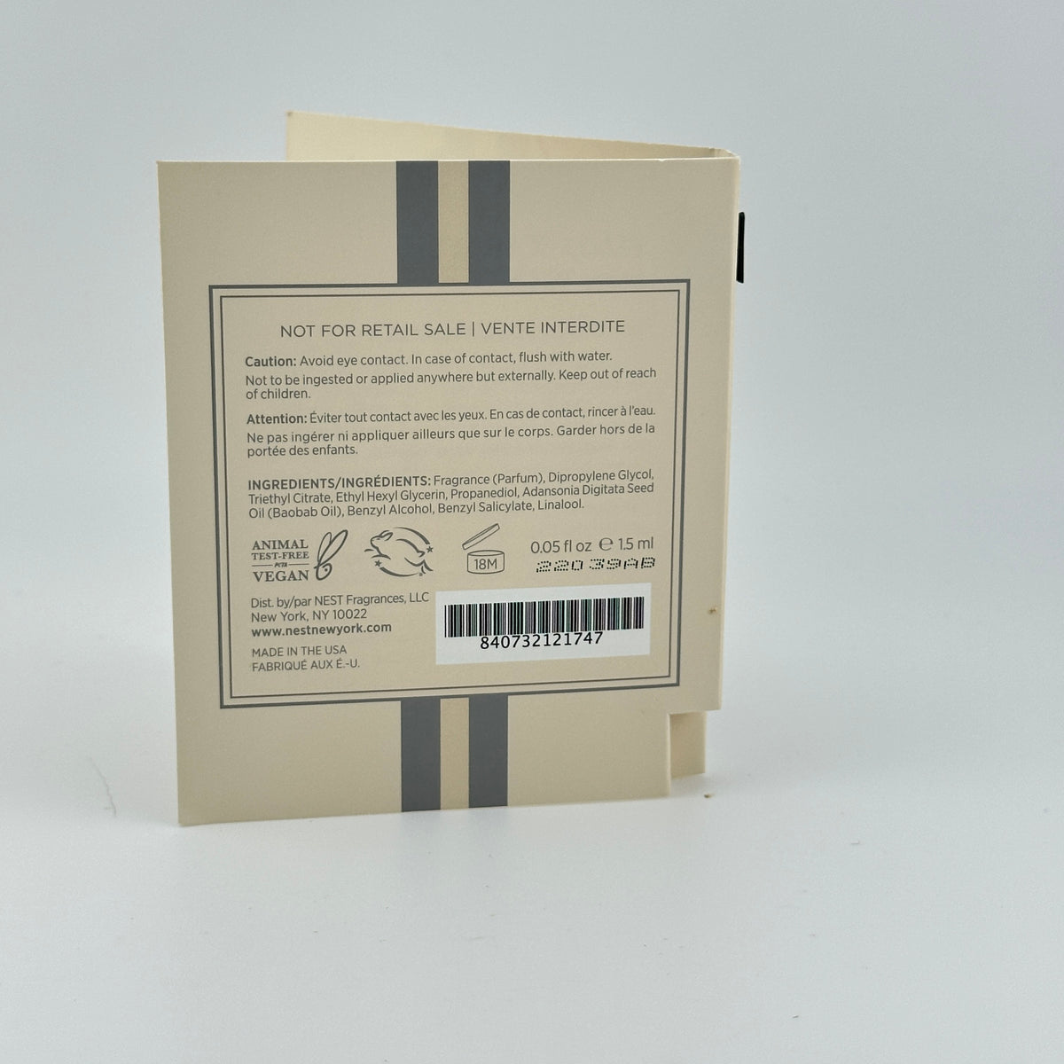 Back of NEST Madagascar Vanilla Perfume Oil 1.5 mL manufacturer sample showing packaging and product details.